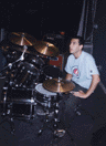 Tom Kuntz performs on drums